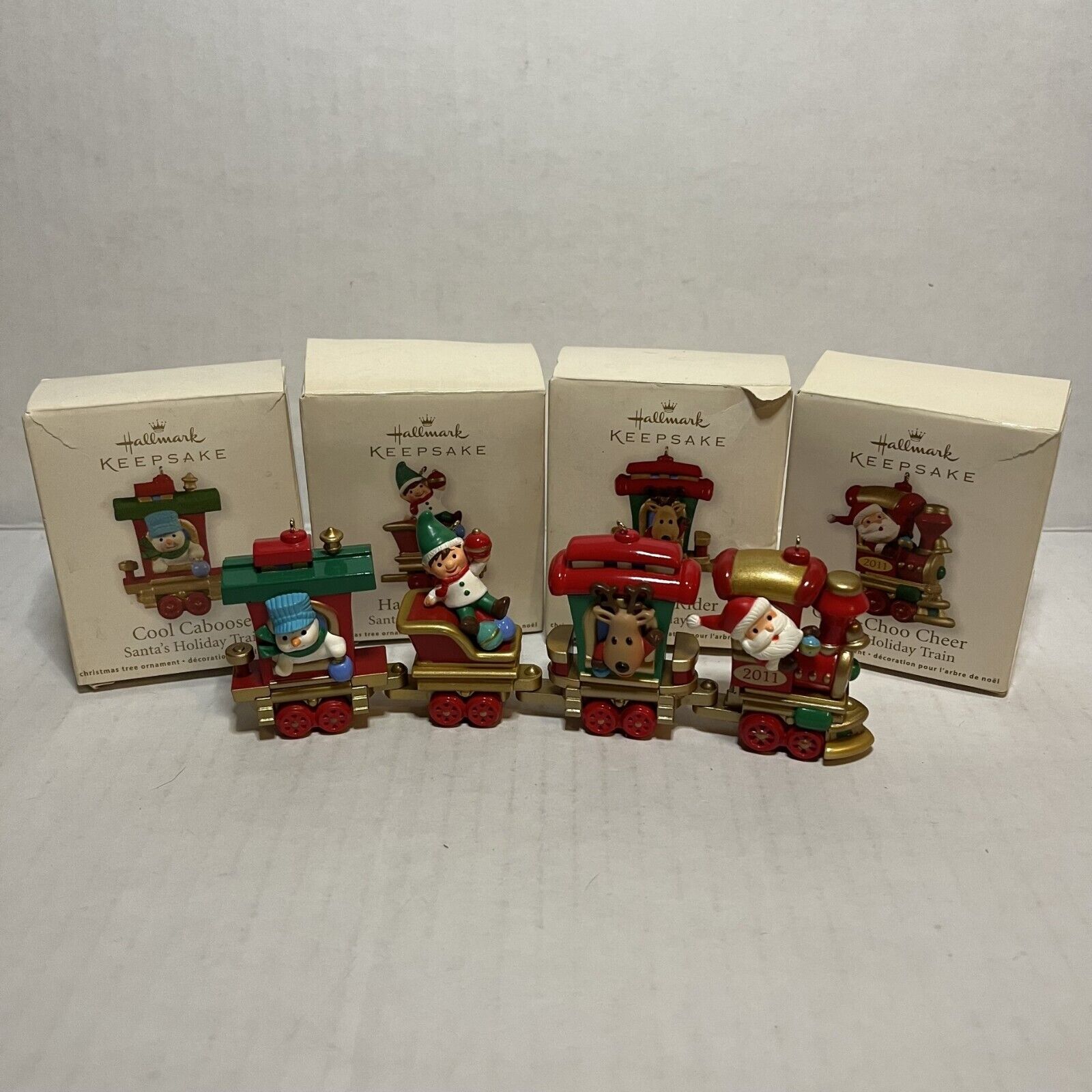 Hallmark Keepsake 2011 Santa's Holiday Train Set of 4 Miniature Ornaments