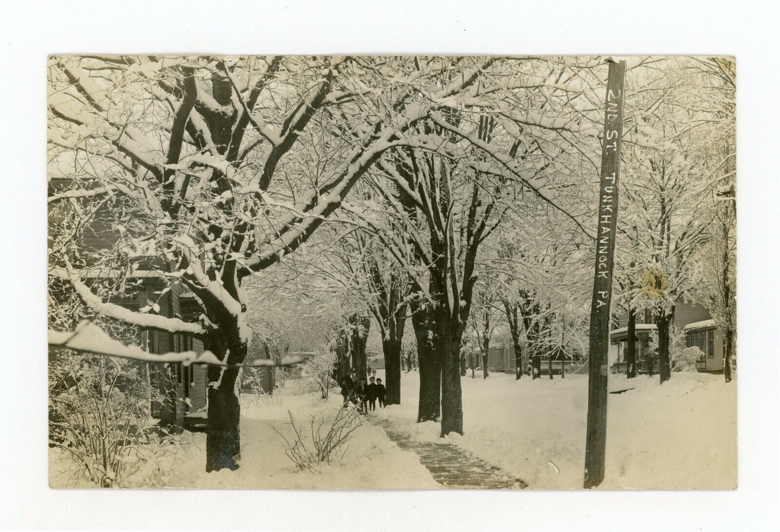 Postcard RPPC Winter Snow scene Tunkhannock PA ca1908