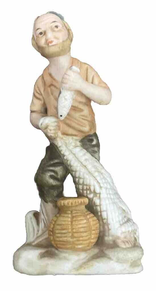 Vintage Porcelain Fisherman Holding Fish 6 1/4 Tall Detailed No Cracks Or Chips