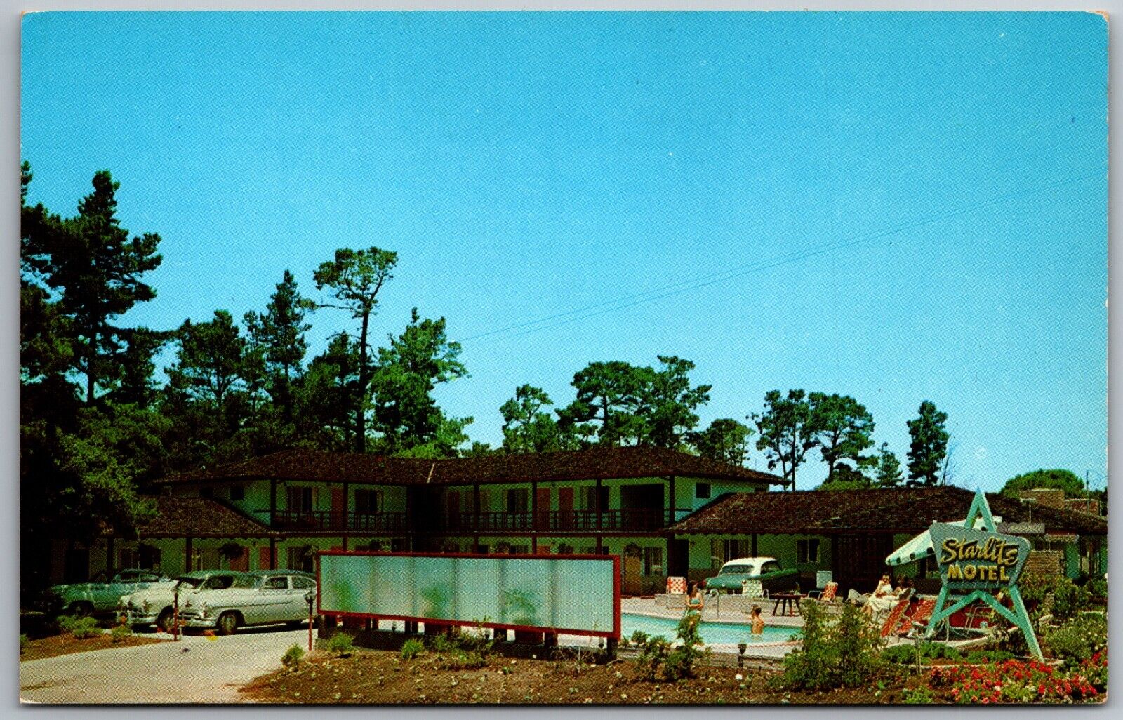 Postcard CA Monterey Starlite Motel swimming pool old cars