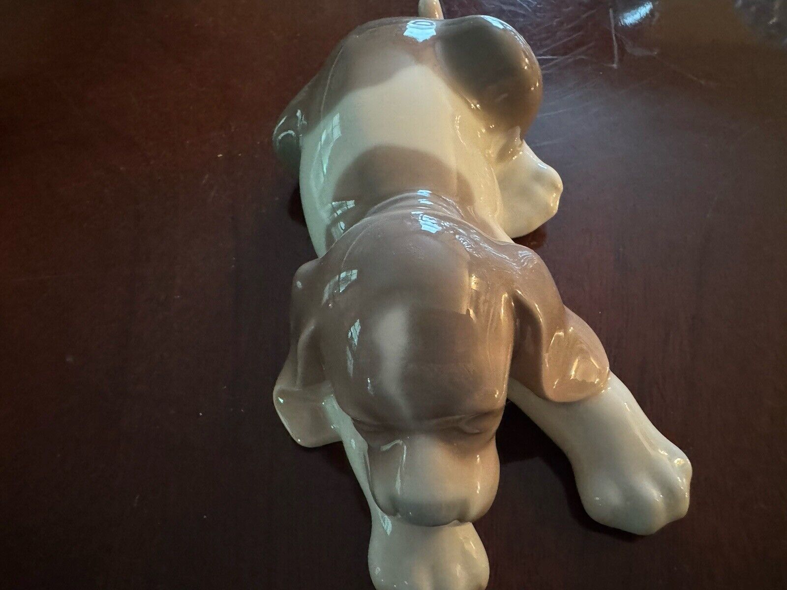 Lladro doggie figurine. Porcelain sleepy dog.