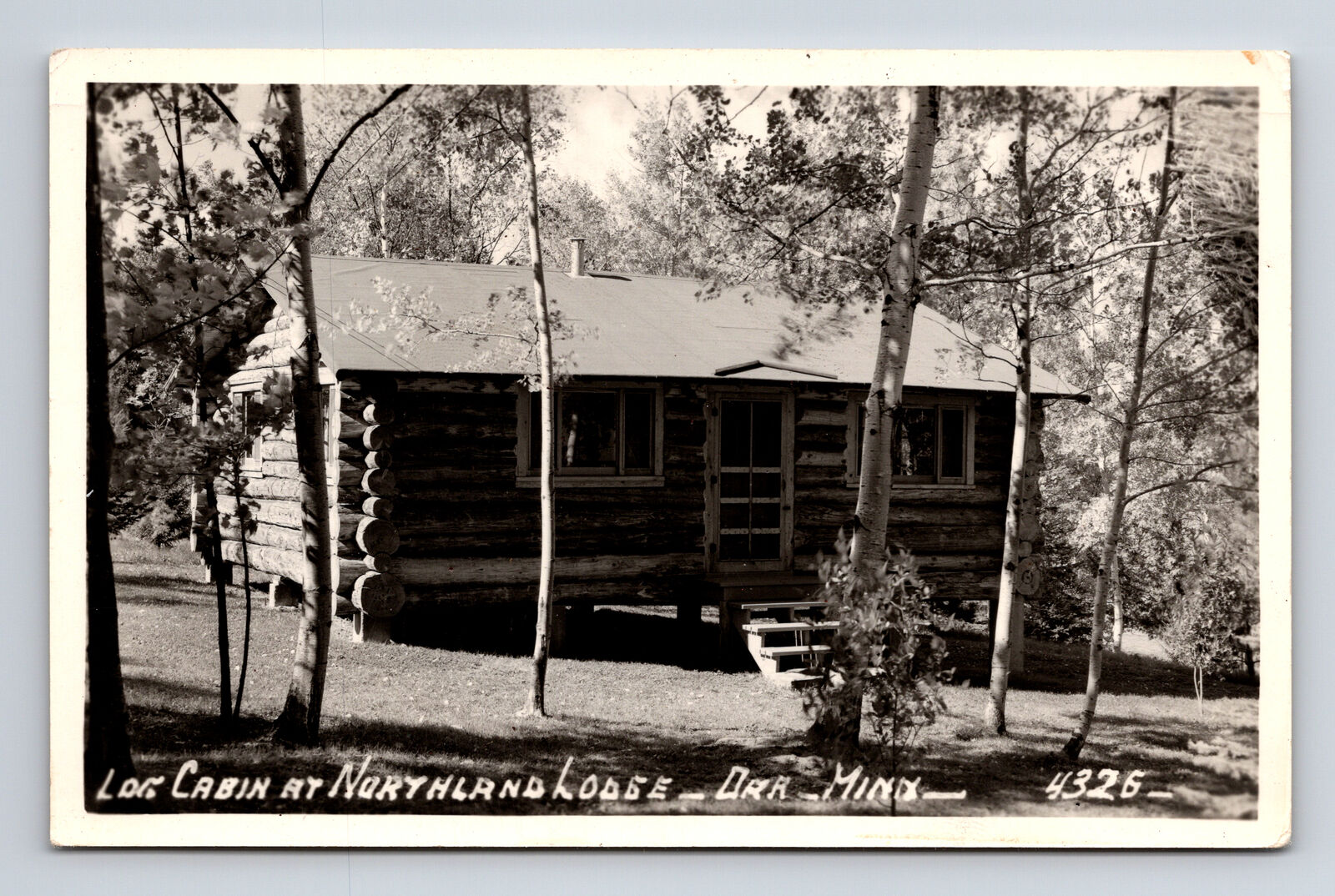 1959 RPPC Northland Lodge Log Cabin Orr MN Postcard