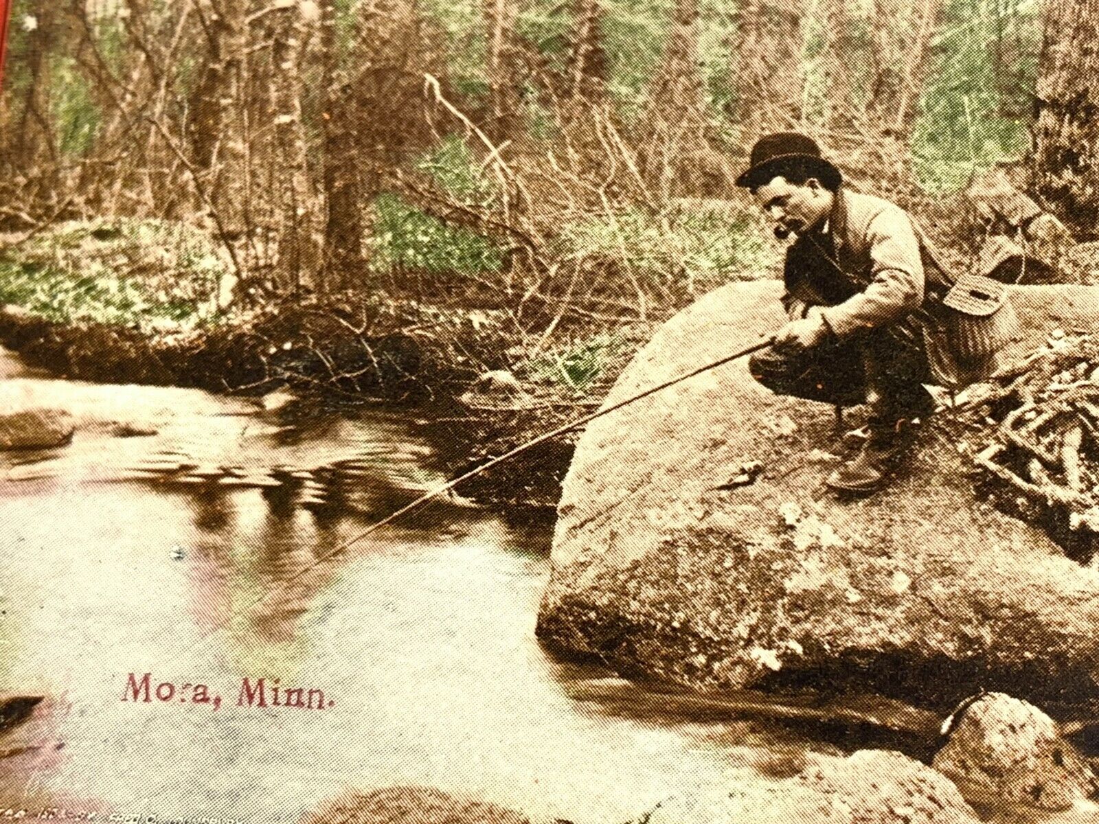 D2) RPPC Photo Postcard Man Fishing Creek River Mora Minnesota 1910 Hand Tint