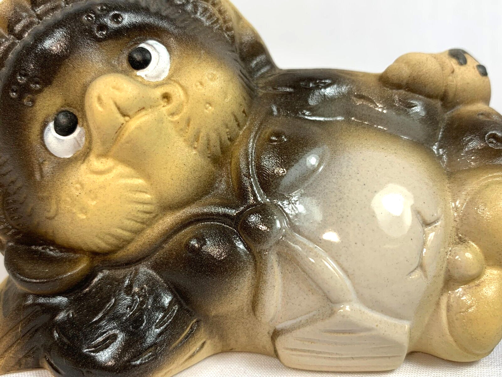 Pottery Tanuki Reclining Japanese Badger Dog As It Waits for Good Luck