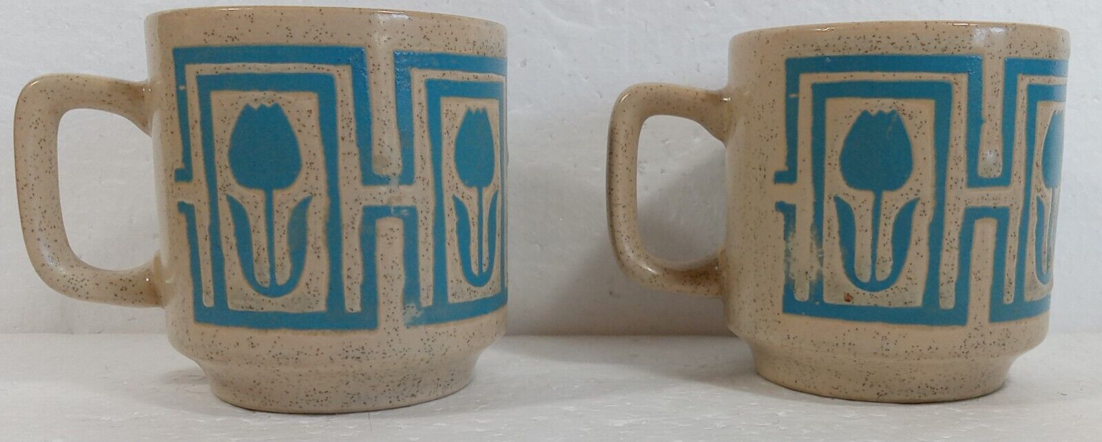 Two Vintage Pottery Coffee Mug Blue Tulips Speckled Has Small Chip 