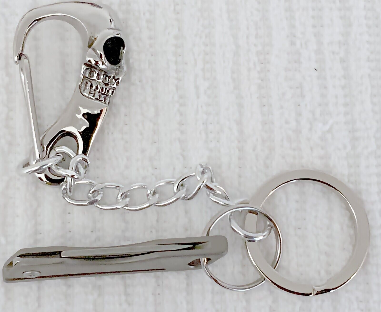 Blacks: Hand Crafted Titanium Skull Mini Knife Keychain
