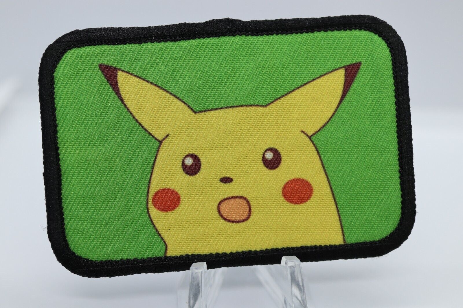 morale patch surprised Pikachu meme Green Background 2