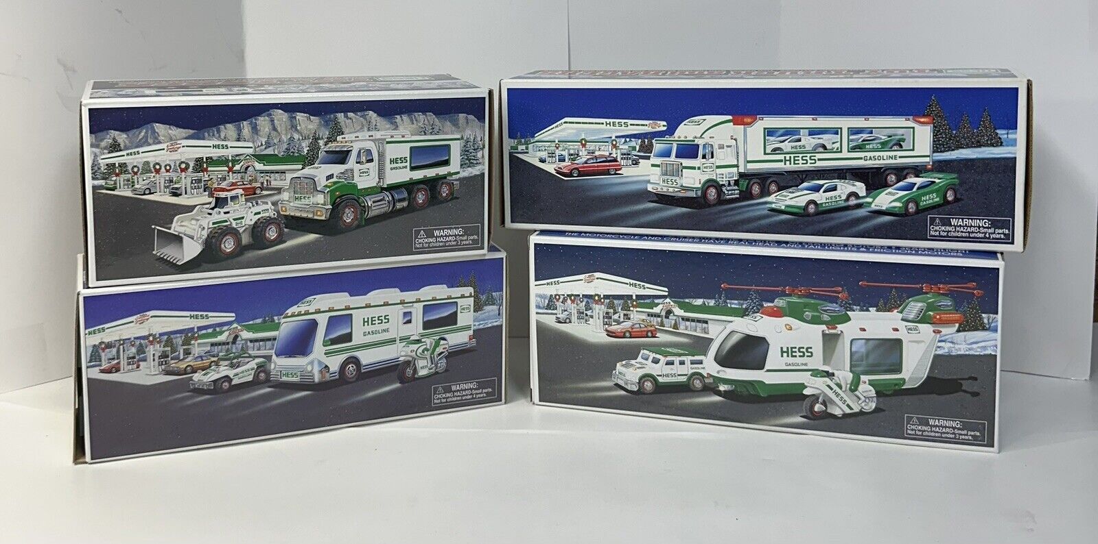 Hess Toy Trucks Lot of 4 NEW IN BOX 1997-1998-2001-2008