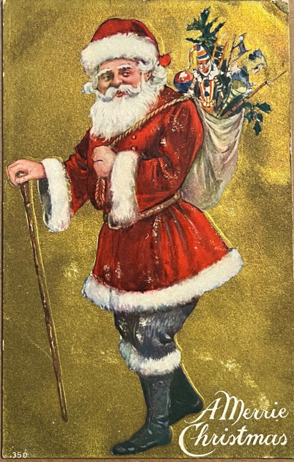 Christmas Santa with Bag of Toys Gold Foil Antique Postcard 1909