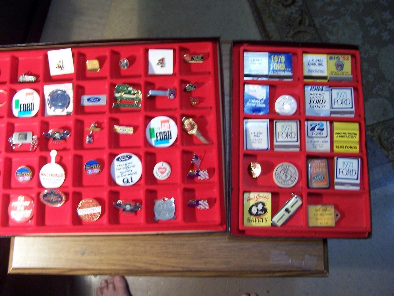 150 + Vintage Ford Pins in 2 display cases some very rare
