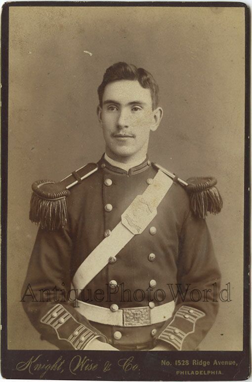 Handsome soldier officer antique cabinet photo