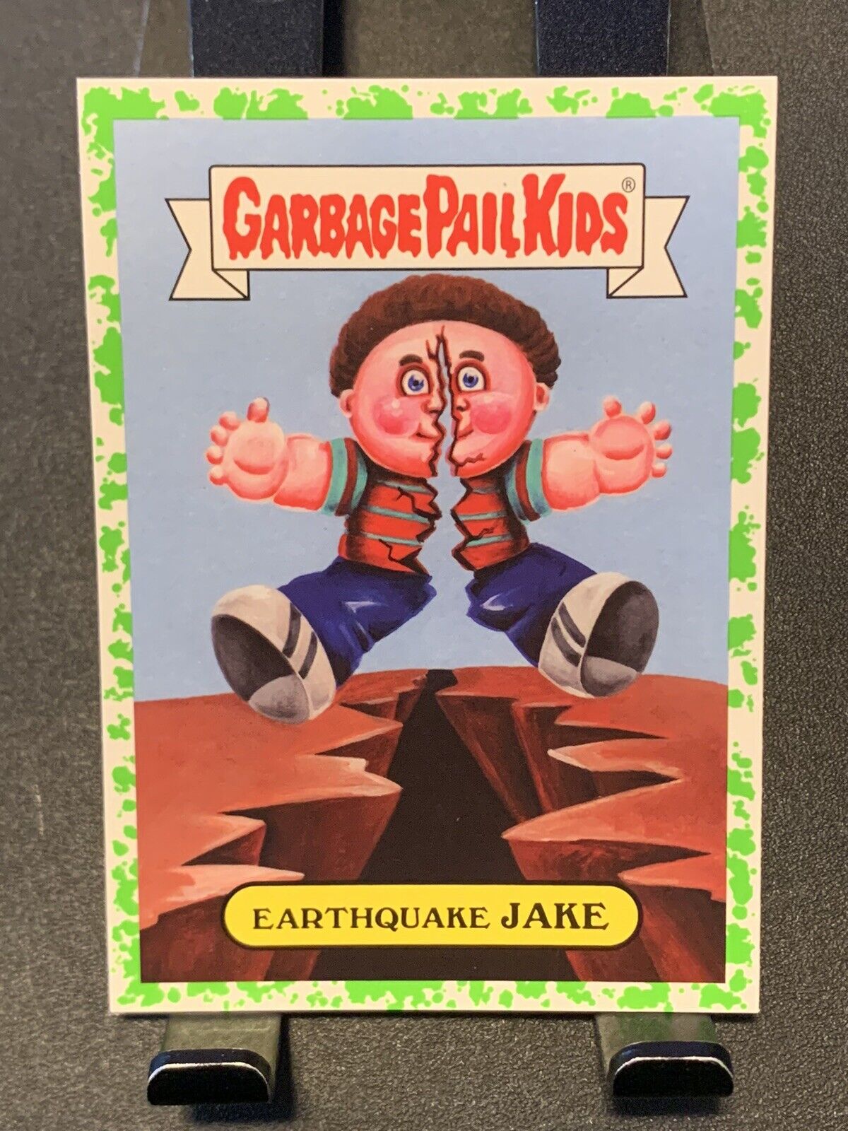 2017 Garbage Pail Kids - Earthquake Jake (Natural Disasters Sticker) *Puke Green