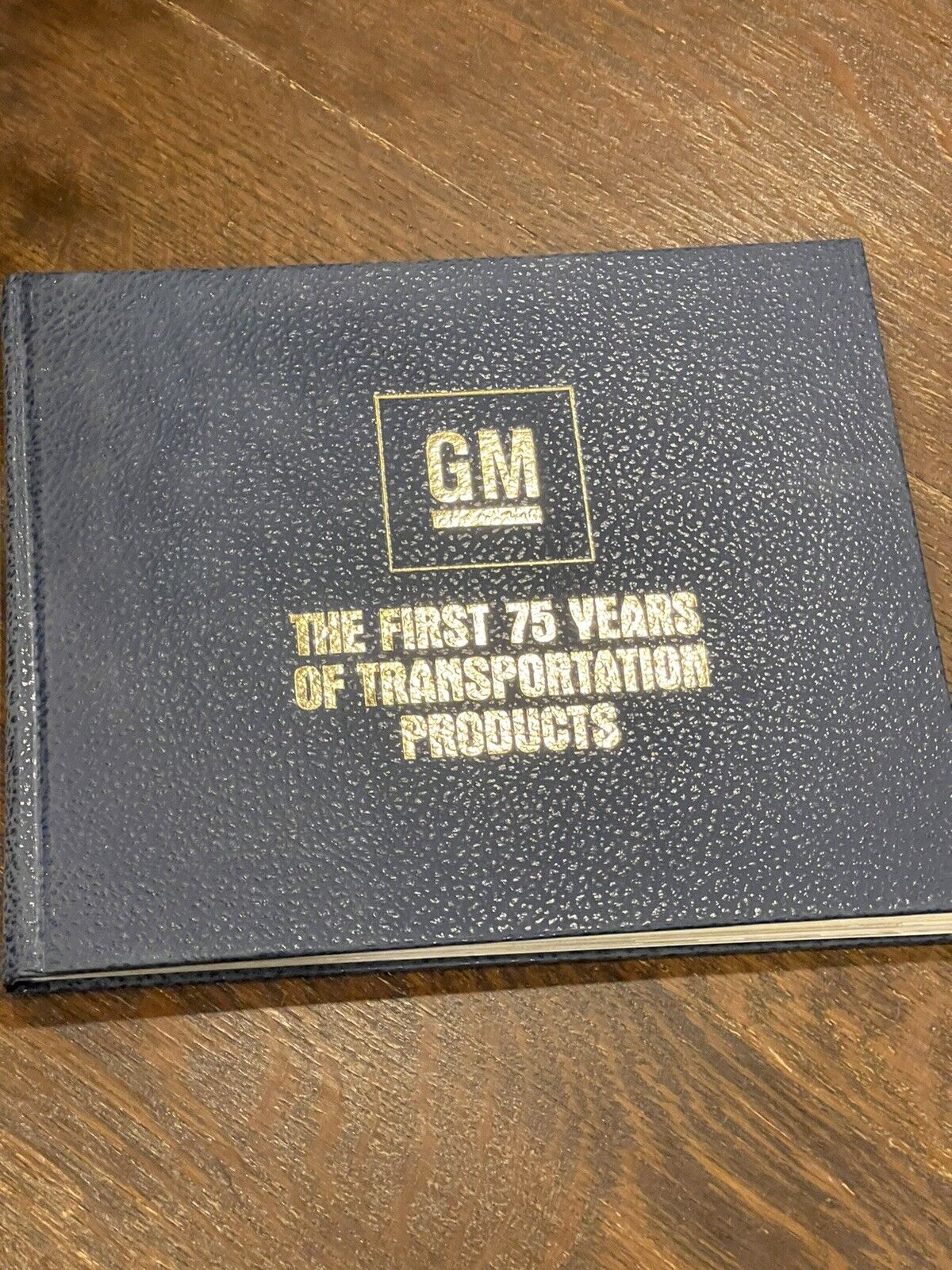 GM THE FIRST 75 YEARS OF TRANSPORTATION PRODUCTS BOOK HARDCOVER 1983 w/letter