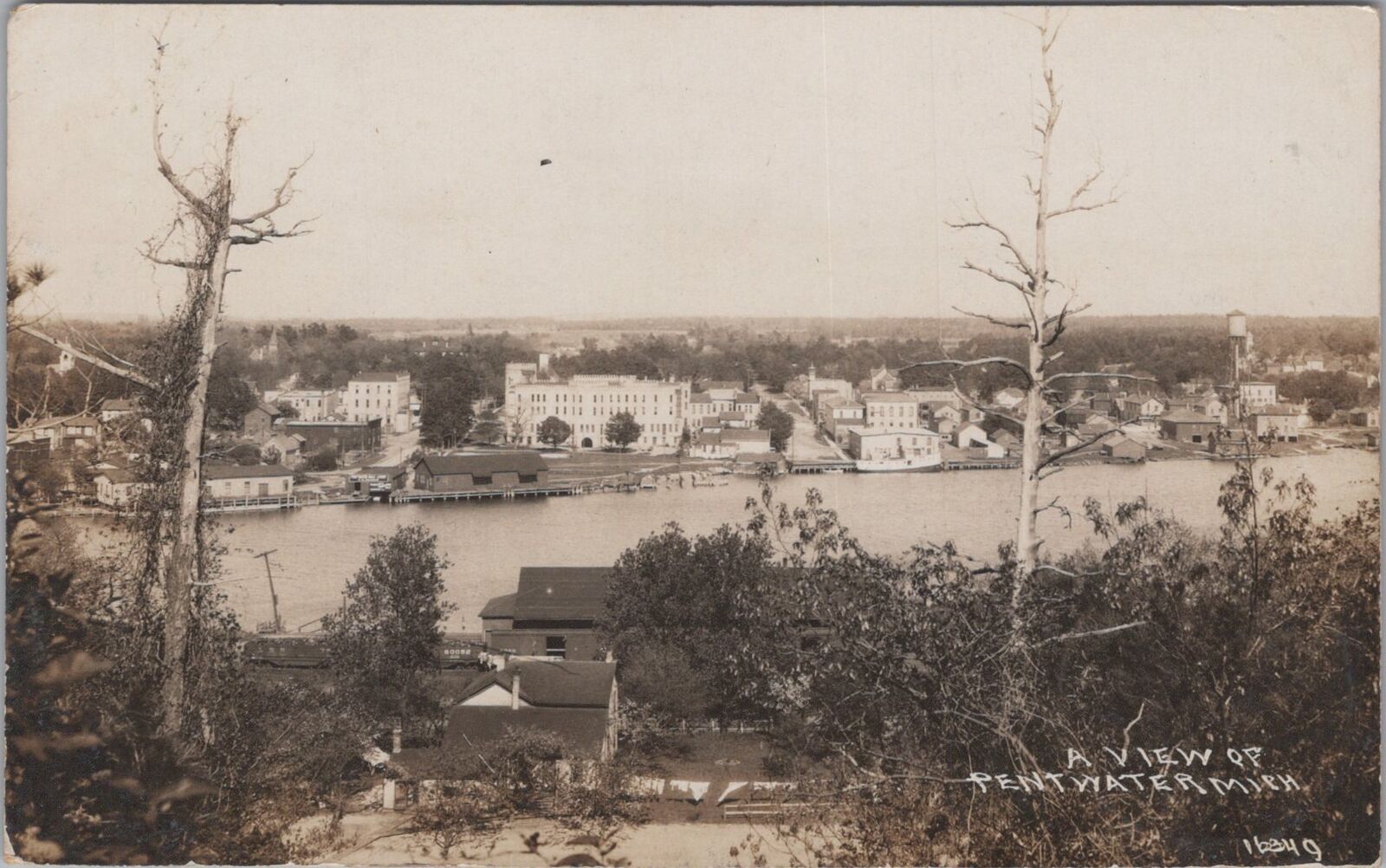 A View of Pentwater Michigan Buildings Houses c1920s RPPC Photo Postcard
