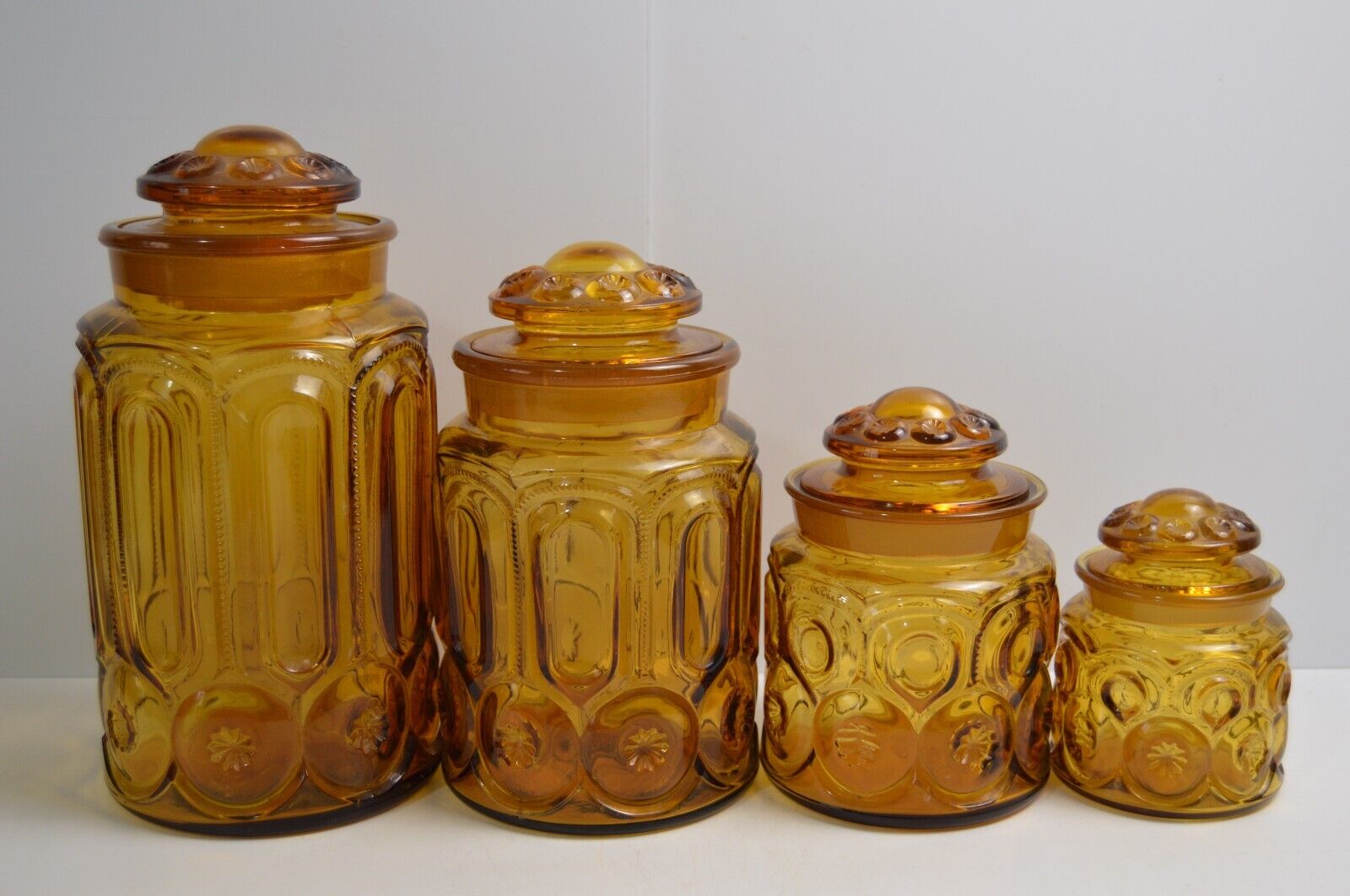 4 Vintage Moon and Stars Glass Canister Set Amber Collectible LE Smith Jars