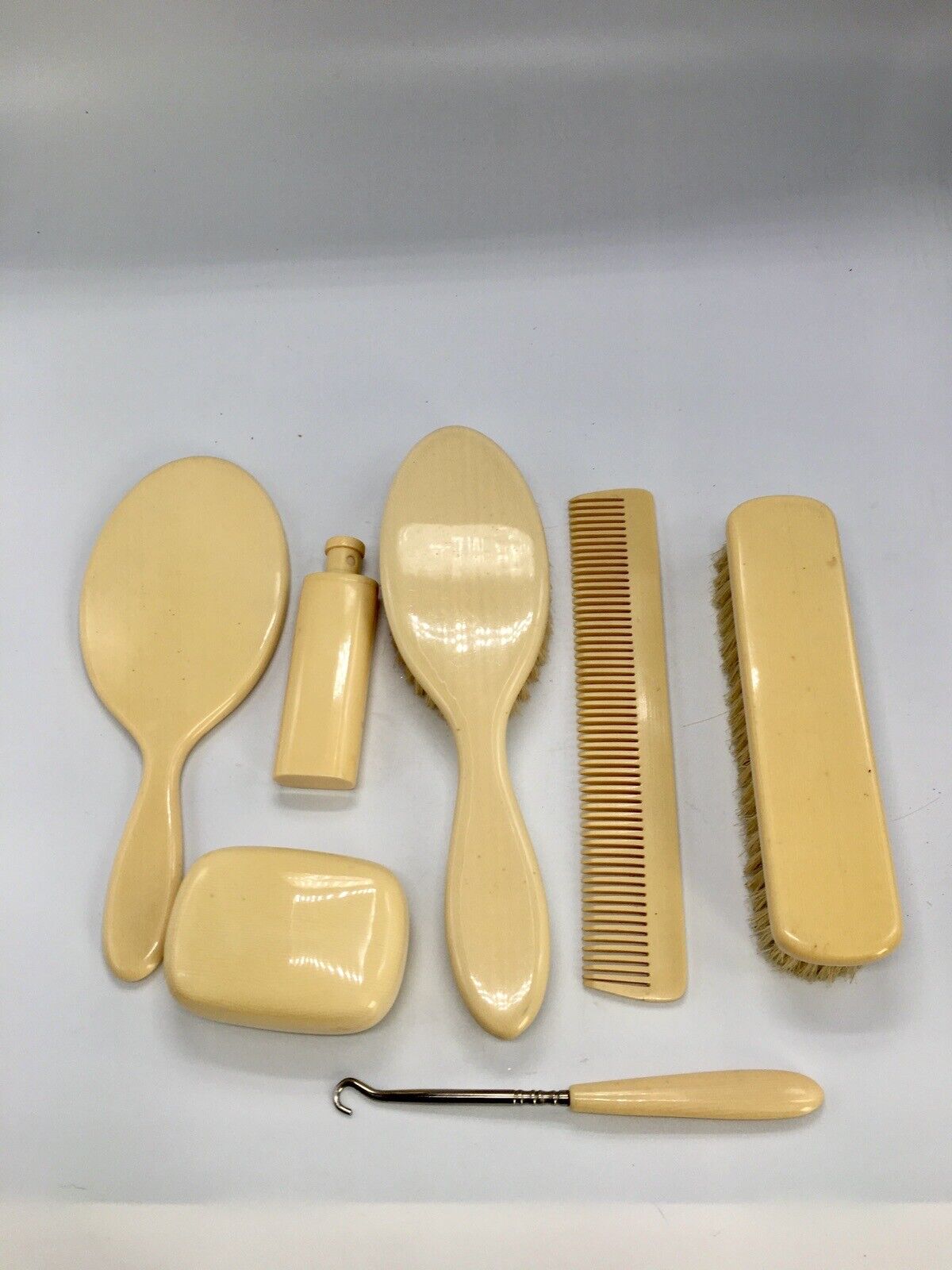 7PC VTG Ivory Celluloid Vanity Dresser Set. Mirror Brush Comb Soap Container