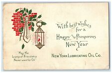 c1905 New Year Candle Lamp Holly Berries New York Lubricating Oil Co. Postcard picture