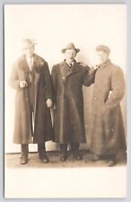 RPPC Three Men In Overcoats with Cigars Clasping Shouldes c1910 Photo Postcard picture