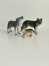 Schleich 2009 Retired Howling Wolf and Retired 2002 Wolf and Pup picture
