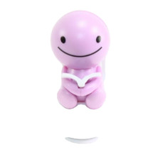 Solar Dancer Purple Pooper Man Reading Newspaper on Toilet Easter Basket Stuffer picture