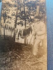 RPPC 1912 Man having great luck on fishing trip postcard a45 picture