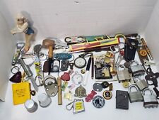 Junk drawer pipe beer key chain risque pocket watch padlocks pens lighter picture