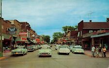 1950s Eagle River Wisconsin Busy Street View Lots of Cars & Signs Postcard picture