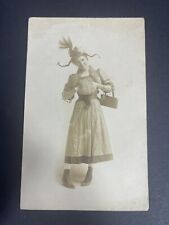 RPPC Of Lady With Hand Muff, Purse, Hat And Crazy Braids  picture