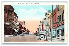 c1920's Drugstore, Cafe, Cars Scene, Front Street Sarnia Ontario Canada Postcard picture