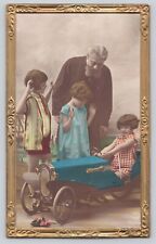Postcard RPPC  Children With Toy Car Automobile Hand Colored Antique France picture