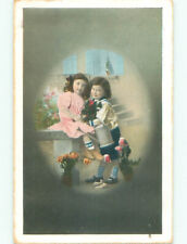 Pre-Linen foreign EUROPEAN GIRL WITH FLOWERS AND BOY WITH WATERING CAN J4345 picture