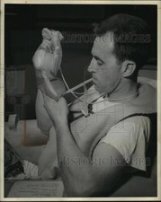 1943 Press Photo Joseph Shaner Tests Seawater Processed Into Drinking Water picture