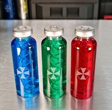 Resident Evil - T-Virus, Anti-Virus, and Nemesis double helix vial prop set picture