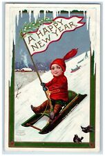 1909 Happy New Year Boy Sledding Mistletoe Clapsaddle Emlenton PA Postcard picture