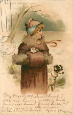 Tuck Postcard S/A Maude Goodman Girl in cape & Muff Carrying Kitten Terrier Dog picture