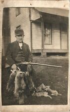 RABBIT HUNTER antique real photo postcard rppc MAN WITH HUNTING RIFLE c1910 picture