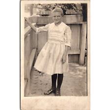 RPPC Teenage Girl Standing byWooden Fence Azo Vintage Postcard Real Photo picture