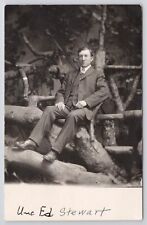 RPPC Uncle Ed Stewart in Studio Sitting on Logs c1910 Real Photo Postcard picture