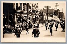 Postcard RPPC c1913 Erie PA Perry Centennial Parade Street View Shops Flags A picture