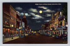 Lancaster OH-Ohio, Night View Of Main Street, Drug Store, Hotel Vintage Postcard picture