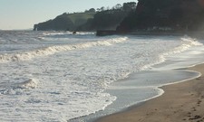 Photo 6x4 Waves at Dawlish Waves break and lap up the beach. On the left c2018 picture