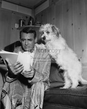 CARY GRANT REVIEWS SCRIPT WITH DOG PAWS ON HIS SHOULDER - 8X10 PHOTO (ZZ-309) picture