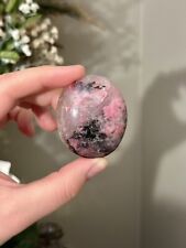 pink rhodonite with quartz inclusions polished crystal palmstone 🌸  picture