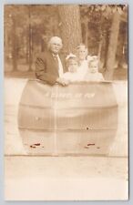 Barrel of Fun Prop Older Man Wife with 2 Young Girls c1904-1918 RPPC Postcard picture