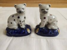 Vtg. Staffordshire cheetah cats? on blue pillows figurines pair. picture