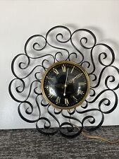 Vintage General Electric Roman Numeral Black and Gold Clock with Iron, Works picture