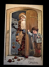 Brown Robe Santa Claus~at Door with Child~Fruit~PFB 1910~Christmas Postcard~k438 picture