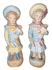 Antique German Hand Painted Bisque Porcelain Figurines Girls Holding Doll READ picture