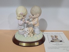 Precious Moments Premier Collection Figures -Actions Speak Louder Than Words picture