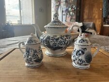 white & blue floral pattern tea pot and matching salt and pepper shakers picture